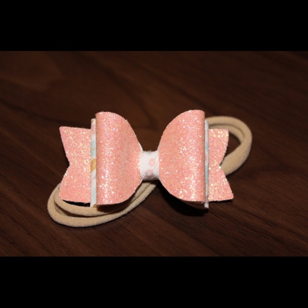 Small double layer peach glitter bow on nylon!